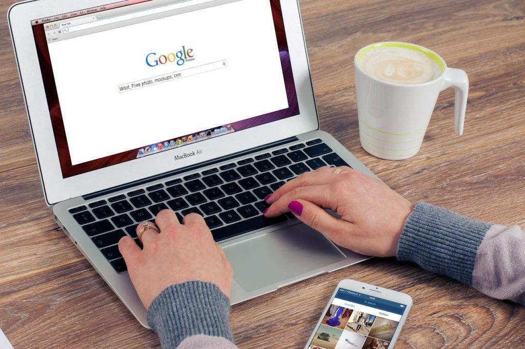 User typing keywords on Google search engine